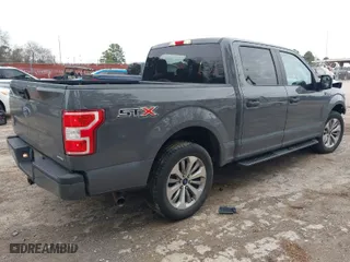 2018 Ford F-150 XL with VIN 1FTEW1CP4JFD00156, listed as a IAAI auction lot 41571979 with 153,167 mi miles. Bid and sale history available at carsss.com. Image 4.