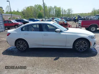 2019 BMW 3 Series 330i xDrive with VIN WBA5R7C54KAJ79214, listed as a IAAI auction lot 42001361 with 103,265 mi miles. Bid and sale history available at carsss.com. Image 14.