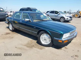 1994 Jaguar XJ with VIN SAJKX174XRC688024, listed as a IAAI auction lot 42640671 with 106,998 mi miles and . Bid and sale history available at DreamBid. Image 1.