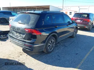 2022 Volkswagen Tiguan S with VIN 3VV1B7AX7NM107779, listed as a IAAI auction lot 41210258 with 57,154 mi miles and . Bid and sale history available at DreamBid. Image 4.