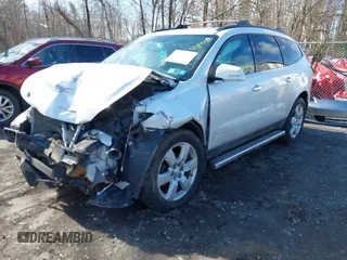 2016 Chevrolet Traverse LT with VIN 1GNKVGKD6GJ146045, listed as a IAAI auction lot 41874364 with 99,486 mi miles and . Bid and sale history available at DreamBid. Image 2.