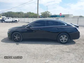 2018 Chevrolet Malibu LS with VIN 1G1ZB5STXJF242615, listed as a IAAI auction lot 41797392 with 136,545 mi miles and . Bid and sale history available at DreamBid. Image 14.