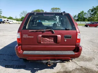 2003 Isuzu Rodeo z VIN 4S2DM58W634305399, wystawiony jako Copart lot #55258335 z przebiegiem 223 105 mil mil oraz Szkody całkowita. Historia ofert i sprzedaży dostępna na DreamBid. Obrazek 6.