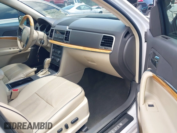 2012 Lincoln MKZ with VIN 3LNHL2GC8CR808103, listed as a IAAI auction lot 42506096 with 129,690 mi miles and . Bid and sale history available at DreamBid. Image 5.
