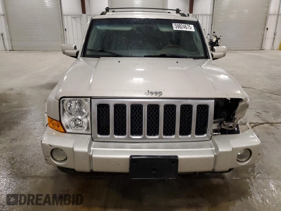 2007 Jeep Commander Overland z VIN 1J8HG68237C610869, wystawiony jako Copart lot #59824675 z przebiegiem 229 092 mil mil oraz Szkoda całkowita • Salvage title. Historia ofert i sprzedaży dostępna na DreamBid. Obrazek 5.