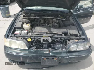 1999 Infiniti Q45 z VIN JNKBY31A6XM600579, wystawiony jako Copart lot #57683075 z przebiegiem 215 415 mil mil oraz Szkoda całkowita • Salvage title. Historia ofert i sprzedaży dostępna na DreamBid. Obrazek 11.