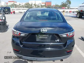 2016 Scion iA z VIN 3MYDLBZVXGY136298, wystawiony jako IAAI lot #42014712 z przebiegiem 124 038 mil mil oraz . Historia ofert i sprzedaży dostępna na DreamBid. Obrazek 17.