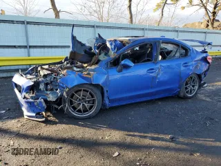 2015 Subaru WRX STI Limited z VIN JF1VA2U60F9812308, wystawiony jako Copart lot #44397295 z przebiegiem Nie podano mil oraz Szkody całkowita. Historia ofert i sprzedaży dostępna na DreamBid. Obrazek 1.