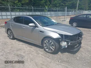 2015 Kia Optima SX Turbo with VIN 5XXGR4A61FG395800, listed as a IAAI auction lot 42562753 with 66,034 mi miles and . Bid and sale history available at DreamBid. Image 1.