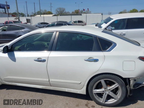 2014 Nissan Altima SL with VIN 1N4BL3AP6EC421665, listed as a IAAI auction lot 41858814 with 199,040 mi miles and . Bid and sale history available at DreamBid. Image 14.