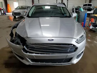 2015 Ford Fusion SE with VIN 3FA6P0H94FR198024, listed as a Copart auction lot 62302505 with 106,346 mi miles and Salvage title. Bid and sale history available at DreamBid. Image 5.