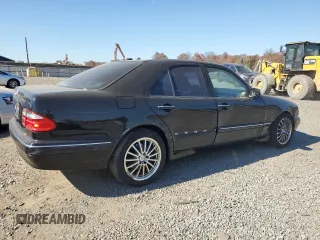 2002 Mercedes-Benz E-Class with VIN WDBJF70J82B492531, listed as a Copart auction lot 77485094 with 85,750 mi miles and Salvage Title. Bid and sale history available at carsss.com. Image 3.