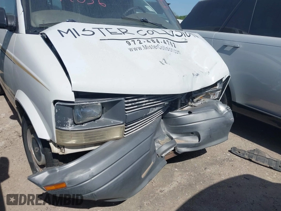 1999 Chevrolet Astro Cargo with VIN 1GCDM19W4XB141901, listed as a IAAI auction lot 41572036 with Not Provided miles. Bid and sale history available at carsss.com. Image 11.