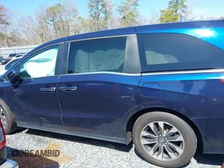 2022 Honda Odyssey EX-L with VIN 5FNRL6H7XNB061061, listed as a IAAI auction lot 41257019 with 52,194 mi miles and . Bid and sale history available at DreamBid. Image 14.