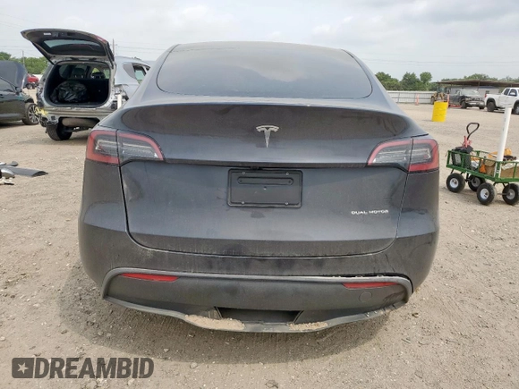 2024 Tesla Model Y Long Range with VIN 7SAYGDEE2RA287446, listed as a Copart auction lot 57640895 with 27,932 mi miles and Salvage title. Bid and sale history available at DreamBid. Image 6.