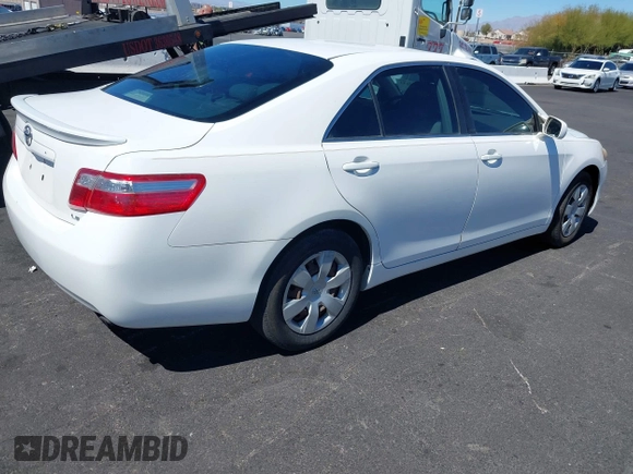 2007 Toyota Camry CE with VIN JTNBE46K473111827, listed as a IAAI auction lot 41872683 with 173,058 mi miles. Bid and sale history available at carsss.com. Image 4.