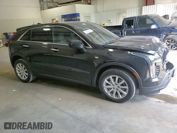 2022 Cadillac XT4 FWD Luxury z VIN 1GYAZAR45NF124737, wystawiony jako Copart lot #53164135 z przebiegiem 41 344 mil mil oraz Szkoda całkowita • Salvage title. Historia ofert i sprzedaży dostępna na DreamBid. Obrazek 11.