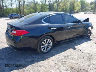 2012 Infiniti M with VIN JN1BY1AR1CM392880, listed as a IAAI auction lot 42012317 with 106,000 mi miles and . Bid and sale history available at DreamBid. Image 4.
