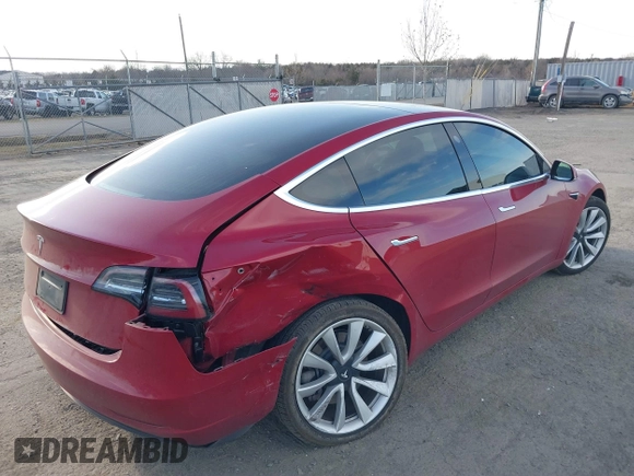 2019 Tesla Model 3 Mid Range with VIN 5YJ3E1EA3KF466418, listed as a IAAI auction lot 41724564 with 53,774 mi miles and . Bid and sale history available at DreamBid. Image 4.