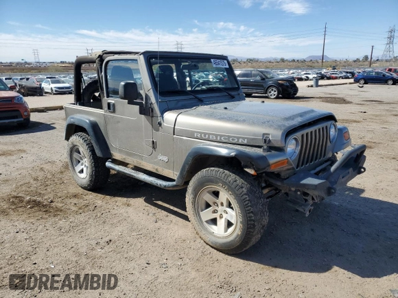 2006 Jeep Wrangler Rubicon with VIN 1J4FA69S36P744801, listed as a Copart auction lot 46541575 with 164,347 mi miles and Salvage title. Bid and sale history available at DreamBid. Image 4.