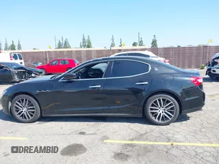 2017 Maserati Ghibli z VIN ZAM57XSA1H1224170, wystawiony jako IAAI lot #42193804 z przebiegiem 90 668 mil mil oraz . Historia ofert i sprzedaży dostępna na DreamBid. Obrazek 14.