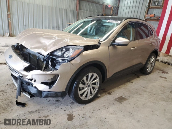 2021 Ford Escape Titanium with VIN 1FMCU9J90MUB15582, listed as a Copart auction lot 50982955 with 27,041 mi miles and Salvage Title. Bid and sale history available at carsss.com. Image 1.