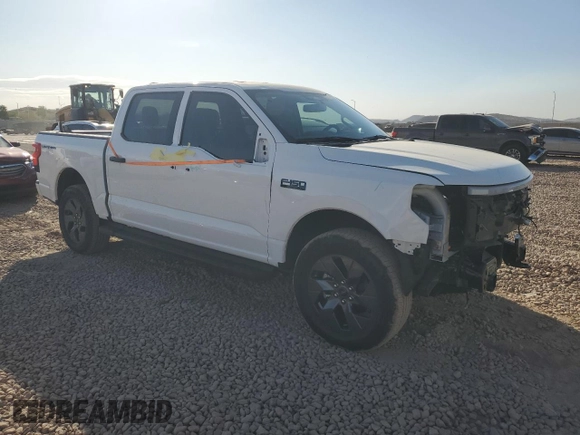 2024 Ford F-150 Lightning XLT with VIN 1FTVW3LK8RWG07888, listed as a Copart auction lot 87741505 with 2,313 mi miles and Salvage title. Bid and sale history available at DreamBid. Image 4.
