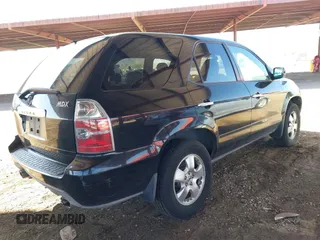 2004 Acura MDX with VIN 2HNYD18244H560067, listed as a IAAI auction lot 41798950 with 175,460 mi miles. Bid and sale history available at carsss.com. Image 4.