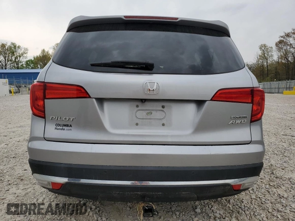 2017 Honda Pilot Touring z VIN 5FNYF6H92HB006855, wystawiony jako Copart lot #53650655 z przebiegiem 130 732 mil mil oraz Szkoda całkowita • Salvage title. Historia ofert i sprzedaży dostępna na DreamBid. Obrazek 6.