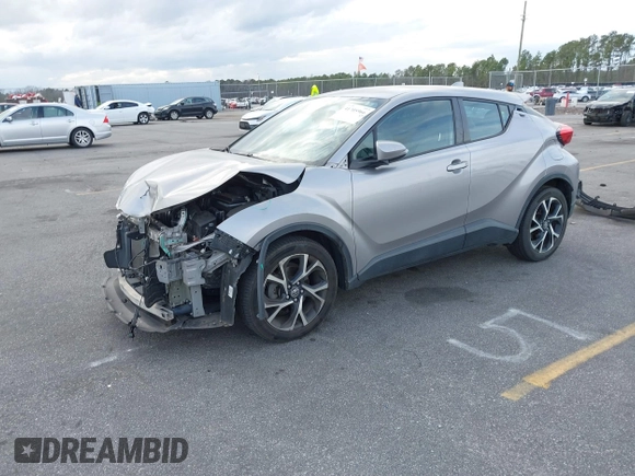 2019 Toyota C-HR XLE with VIN NMTKHMBX7KR078292, listed as a IAAI auction lot 41705966 with 104,352 mi miles. Bid and sale history available at carsss.com. Image 18.