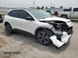 2021 Ford Escape SE Hybrid with VIN 1FMCU9BZ1MUB21115, listed as a Copart auction lot 60220795 with 73,083 mi miles and Salvage title. Bid and sale history available at DreamBid. Image 4.
