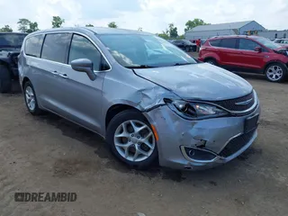 2018 Chrysler Pacifica Touring Plus with VIN 2C4RC1FG9JR104549, listed as a IAAI auction lot 42573235 with 71,198 mi miles and . Bid and sale history available at DreamBid. Image 1.
