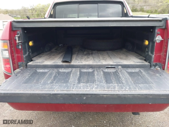 2006 Honda Ridgeline RT with VIN 2HJYK16276H535600, listed as a IAAI auction lot 42056441 with 221,671 mi miles. Bid and sale history available at carsss.com. Image 12.
