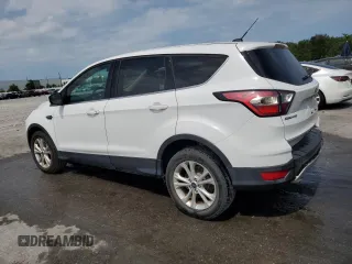 2017 Ford Escape SE z VIN 1FMCU0GD9HUE38848, wystawiony jako Copart lot #56859745 z przebiegiem 69 404 mil mil oraz Szkoda całkowita • Salvage title. Historia ofert i sprzedaży dostępna na DreamBid. Obrazek 2.
