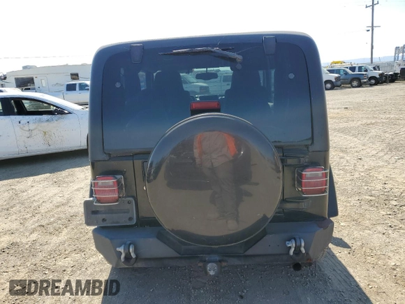 2004 Jeep Wrangler Sahara with VIN 1J4FA59SX4P718591, listed as a Copart auction lot 59907805 with 241,994 mi miles and Clean title. Bid and sale history available at DreamBid. Image 6.