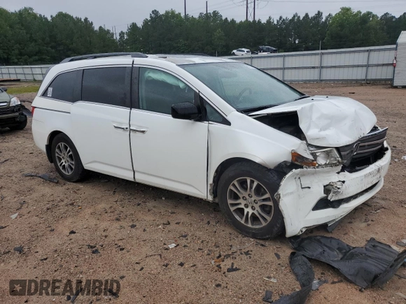 2013 Honda Odyssey EX-L with VIN 5FNRL5H62DB048370, listed as a Copart auction lot 63013465 with 129,552 mi miles and Salvage title. Bid and sale history available at DreamBid. Image 4.