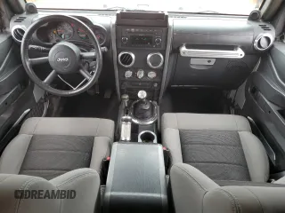 2009 Jeep Wrangler X with VIN 1J4FA24159L730840, listed as a Copart auction lot 56278745 with 95,851 mi miles and Salvage title. Bid and sale history available at DreamBid. Image 8.