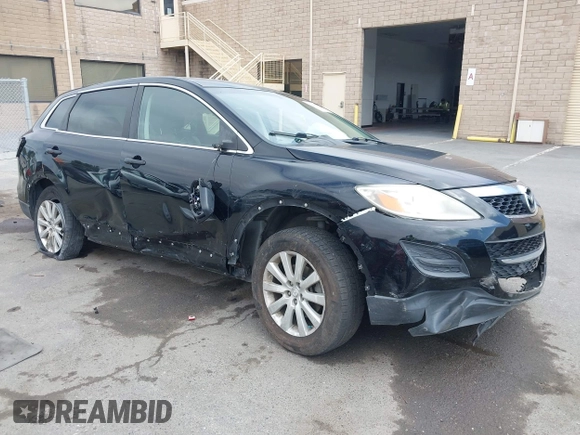 2010 Mazda CX-9 Grand Touring with VIN JM3TB2MV1A0203416, listed as a IAAI auction lot 42090500 with 131,659 mi miles and . Bid and sale history available at carsss.com. Image 1.