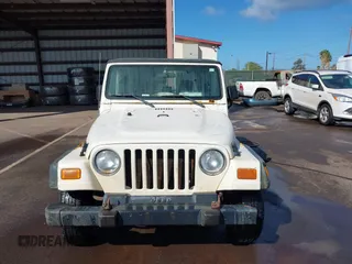 2004 Jeep Wrangler X z VIN 1J4FA39S04P747828, wystawiony jako IAAI lot #41484240 z przebiegiem Nie podano mil oraz . Historia ofert i sprzedaży dostępna na DreamBid. Obrazek 6.