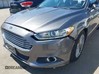 2014 Ford Fusion SE Hybrid with VIN 3FA6P0LU9ER142204, listed as a IAAI auction lot 41964308 with 177,499 mi miles. Bid and sale history available at carsss.com. Image 6.