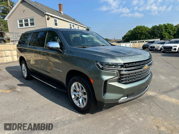 2023 Chevrolet Suburban Premier with VIN 1GNSCFKD0PR550962, listed as a Copart auction lot 63825105 with 24,722 mi miles and Salvage title. Bid and sale history available at DreamBid. Image 4.