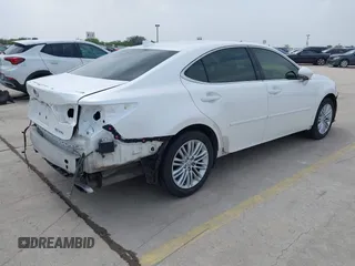 2016 Lexus ES with VIN JTHBK1GGXG2242903, listed as a IAAI auction lot 41911044 with 84,278 mi miles. Bid and sale history available at carsss.com. Image 4.