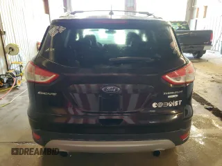 2013 Ford Escape Titanium z VIN 1FMCU9J90DUA98718, wystawiony jako Copart lot #63683005 z przebiegiem 101 036 mil mil oraz Czysty tytuł • Clean title. Historia ofert i sprzedaży dostępna na DreamBid. Obrazek 6.