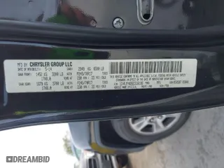 2014 Jeep Grand Cherokee Laredo with VIN 1C4RJFAG9EC516138, listed as a IAAI auction lot 42055214 with 135,701 mi miles. Bid and sale history available at carsss.com. Image 9.