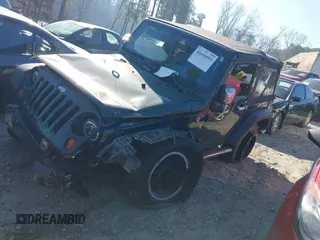 2010 Jeep Wrangler Sport with VIN 1J4AA2D16AL212492, listed as a IAAI auction lot 41656955 with 225,718 mi miles and . Bid and sale history available at carsss.com. Image 13.