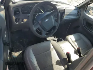 2010 Ford Ranger XL with VIN 1FTKR1AD9APA75973, listed as a Copart auction lot 56220795 with 98,648 mi miles and Salvage title. Bid and sale history available at DreamBid. Image 8.