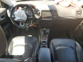2017 Jeep Compass Trailhawk with VIN 3C4NJDDBXHT668053, listed as a Copart auction lot 63032155 with 94,090 mi miles and Salvage title. Bid and sale history available at DreamBid. Image 8.