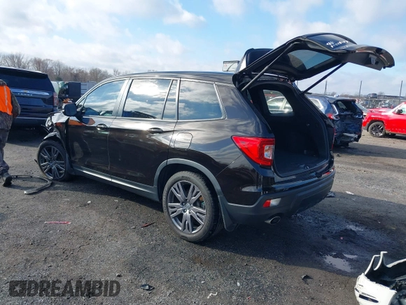 2021 Honda Passport EX-L with VIN 5FNYF7H56MB009450, listed as a IAAI auction lot 41474645 with 91,140 mi miles. Bid and sale history available at carsss.com. Image 3.