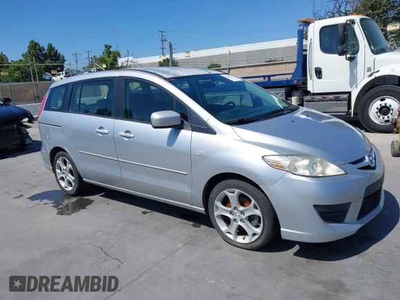 2009 Mazda 5 Touring z VIN JM1CR29L090334702, wystawiony jako IAAI lot #42349375 z przebiegiem 188 173 mil mil oraz . Historia ofert i sprzedaży dostępna na DreamBid. Obrazek 1.