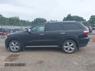 2013 Dodge Durango Citadel with VIN 1C4SDJET3DC563618, listed as a IAAI auction lot 42828144 with 202,648 mi miles and . Bid and sale history available at DreamBid. Image 14.